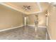 Spacious bedroom with neutral walls and tile flooring at 1653 Promenade Cir, Port Orange, FL 32129