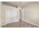 Neutral bedroom showcasing sliding door closet and neutral wall color, creating a serene retreat at 1653 Promenade Cir, Port Orange, FL 32129