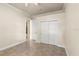 Bright bedroom featuring a ceiling fan and a closet with sliding doors at 1653 Promenade Cir, Port Orange, FL 32129