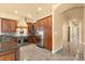 Spacious kitchen with stainless steel appliances and tile flooring at 1653 Promenade Cir, Port Orange, FL 32129