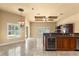 Open-plan living room next to a minibar with lots of natural light at 1653 Promenade Cir, Port Orange, FL 32129