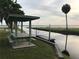 Community area with picnic shelter, tables, and beautiful water view at 1725 Turtle Hill Rd, Enterprise, FL 32725