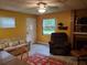 Bright living room with windows offering a view to the outside at 1725 Turtle Hill Rd, Enterprise, FL 32725