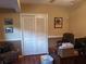 Inviting office features neutral tones, wood floors, and storage for a productive workspace at 1725 Turtle Hill Rd, Enterprise, FL 32725