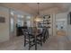 Elegant dining room with decorative ceiling and natural light coming in through the windows at 18 Foxfords, Ormond Beach, FL 32174