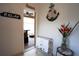 Hallway featuring decor, with an outdoor view, and tile flooring at 18 Foxfords, Ormond Beach, FL 32174