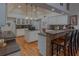 Spacious kitchen with an island, breakfast bar, and wooden flooring at 18 Foxfords, Ormond Beach, FL 32174