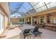 Inviting backyard pool area with lounge chairs, outdoor bar, and covered patio at 18 Foxfords, Ormond Beach, FL 32174