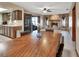 Open dining and kitchen area with view of the fireplace, with table that has seating for six at 1904 Viking Ave, Deltona, FL 32725