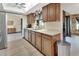 Spacious kitchen featuring stainless steel appliances, granite countertops, and a bright and airy atmosphere at 1904 Viking Ave, Deltona, FL 32725