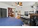 Bright primary bedroom featuring adjacent gym, closet and ensuite bathroom at 191 Sedona Cir, Daytona Beach, FL 32124