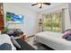 Bright bedroom featuring television, window and closet at 191 Sedona Cir, Daytona Beach, FL 32124