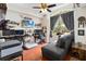 Bedroom featuring work and relaxation space with monitor setup and couch at 191 Sedona Cir, Daytona Beach, FL 32124