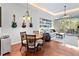 Cozy dining area with hard floors, ornate chairs, and guitars on display at 191 Sedona Cir, Daytona Beach, FL 32124