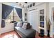 Cozy living room featuring a comfortable chaise lounge, natural light, and unique decor, creating a welcoming space at 191 Sedona Cir, Daytona Beach, FL 32124
