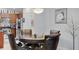 Elegant dining room with a round table, ornate chairs, and a modern chandelier at 19343 Moorgate St, Orlando, FL 32833