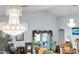 Bright living room with an elegant chandelier and comfortable seating at 19343 Moorgate St, Orlando, FL 32833