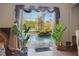 Open living room showcasing view of screened pool and outdoor scenery at 19343 Moorgate St, Orlando, FL 32833