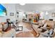 Spacious open floor plan showcasing living, dining, and kitchen areas with hardwood flooring at 19343 Moorgate St, Orlando, FL 32833