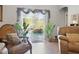 Cozy living room showcasing view of screened pool and outdoor scenery at 19343 Moorgate St, Orlando, FL 32833