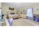 Spacious main bedroom with a plush bed, accent rug and ample natural light at 19343 Moorgate St, Orlando, FL 32833