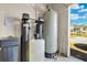Garage features water softening equipment, ensuring pure water throughout the home at 19343 Moorgate St, Orlando, FL 32833