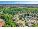 Aerial view showcases a neighborhood, a large pond, and access to Tomoka Town Center and I-95 at 200 Gala Cir, Daytona Beach, FL 32124