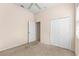 Bedroom with carpet, ceiling fan, closet, and a window offering plenty of natural light at 200 Gala Cir, Daytona Beach, FL 32124
