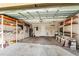 Spacious garage features built-in shelving, a utility sink, and ample room for storage and projects at 200 Gala Cir, Daytona Beach, FL 32124