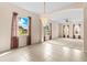 Bright living room featuring elegant lighting, large windows, and an open layout at 200 Gala Cir, Daytona Beach, FL 32124