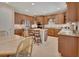 Spacious kitchen with a center island, stainless steel appliances, and adjacent dining area at 2004 Quail Hollow Dr, Deland, FL 32720