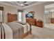 Spacious bedroom with neutral tones, and a large dresser at 2004 Quail Hollow Dr, Deland, FL 32720