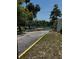 Community boat launch area with bench overlooking the water at 2004 Quail Hollow Dr, Deland, FL 32720