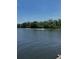 View of the lake with jet skis on the water at 2004 Quail Hollow Dr, Deland, FL 32720