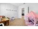 Bright bedroom featuring playful wall art, creating a fun and imaginative space at 211 Duke Dr, Deland, FL 32724