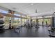 Well-equipped gym with modern cardio machines, weights, and large windows offering scenic views for an active lifestyle at 211 Duke Dr, Deland, FL 32724