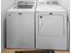 Convenient laundry area with a matching washer and dryer set at 211 Duke Dr, Deland, FL 32724