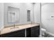 Bright bathroom featuring double sinks and modern vanities with stylish countertops at 2379 8Th Ave, Deland, FL 32724