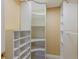 The closet features built-in shelving with a variety of shapes and sizes at 2418 Formosa Ave, Orlando, FL 32804