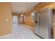 The dining area features tile floors, neutral walls, and stainless steel refrigerator at 2418 Formosa Ave, Orlando, FL 32804