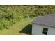 Expansive backyard featuring lush greenery, perfect for outdoor activities and relaxation at 248 S Virginia Ave, Deland, FL 32724