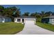 Charming single-story home with a well-manicured lawn and an attached two-car garage at 248 S Virginia Ave, Deland, FL 32724