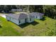 Charming home exterior boasting manicured lawn and well-maintained landscaping at 248 S Virginia Ave, Deland, FL 32724