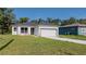 Beautiful single-story home with a well-maintained lawn and a convenient two-car garage at 248 S Virginia Ave, Deland, FL 32724