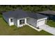 Elevated corner view of the single-Gathering home featuring a side entry garage, landscaping, and lush lawn at 248 S Virginia Ave, Deland, FL 32724