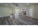 Bright living space with modern flooring, recessed lighting and plenty of open space at 248 S Virginia Ave, Deland, FL 32724