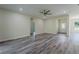 Spacious living area featuring modern flooring, recessed lighting, and arched doorways at 248 S Virginia Ave, Deland, FL 32724