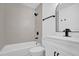 This bathroom features a tub, shower, vanity and mirror at 2517 Oak Hollow Dr, Kissimmee, FL 34744