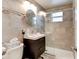 Modern bathroom with glass-enclosed shower, stylish vanity, and neutral-toned tile work at 26 Ocean Shore Dr, Ormond Beach, FL 32176
