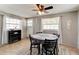 Cozy dining area with a round table, comfortable seating, and bright natural light at 26 Ocean Shore Dr, Ormond Beach, FL 32176